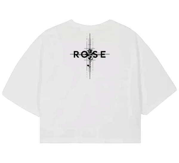 Polo crop con diseño de rosa en tonos grises y palabras inspiradoras como elegant, respect, powerful, junto con una frase motivacional en español. Estilo moderno y sofisticado.